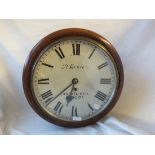 An antique circular wall clock by Benson 11.5“ DIA