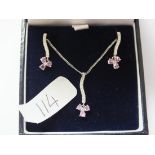 Attractive 18ct white gold pendant necklace of diamonds and pink sapphires with matching drop