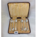Boxed set of six Chippendale pattern tea spoons and tongs. B'ham 1928 70g.