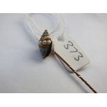 Gold mounted turquoise and pearl stick pin in the form of a shell
