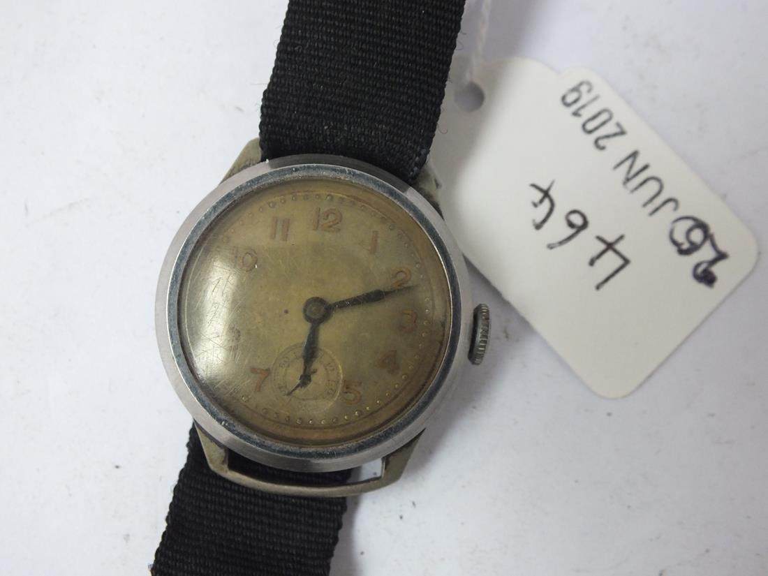 Military wrist watch with seconds hand