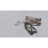 Two stylish silver brooches