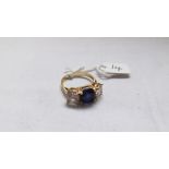 A blue & white stone dress ring in 14ct gold