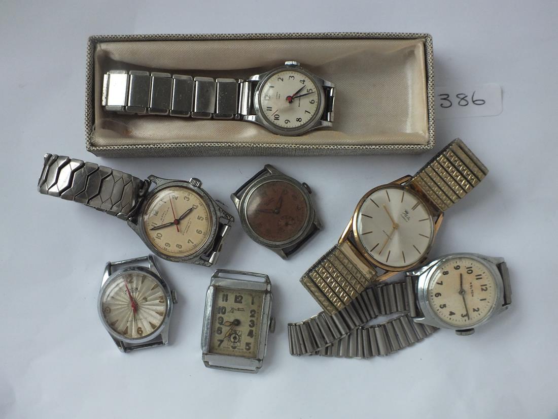 A bag of seven vintage wrist watches