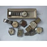 A bag of seven vintage wrist watches