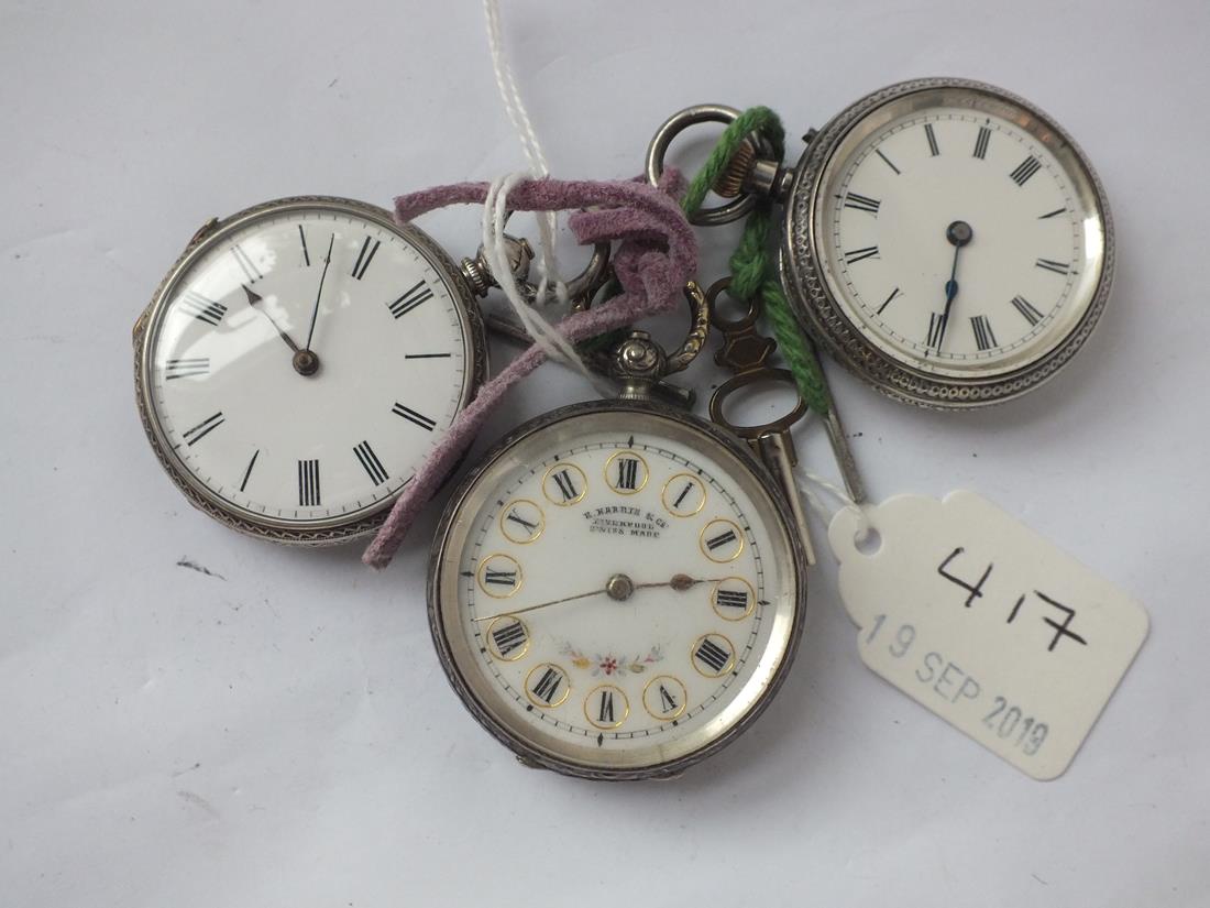 Three ladies silver pocket watches, one with a key