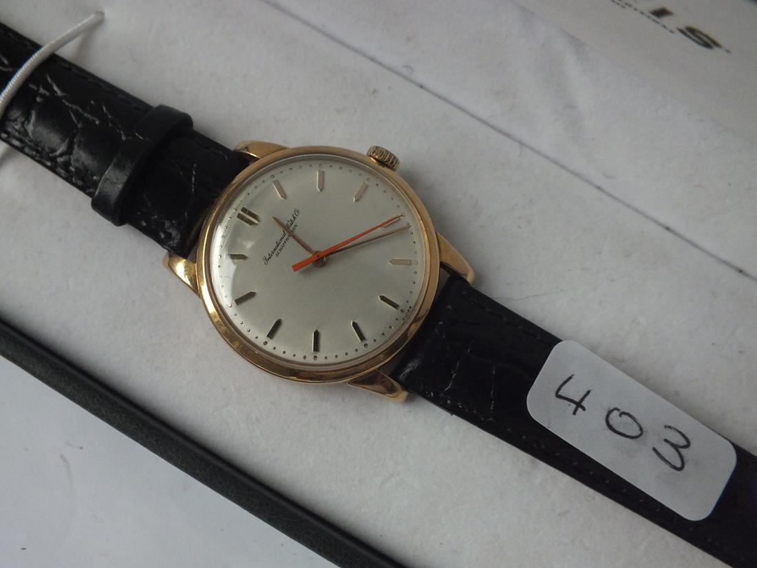 18ct. gold INTERNATIONAL WATCH Co. gents wrist watch with seconds sweep and leather strap