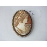 Gilt cameo brooch set with pearl border