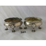 Pair of Georgian heavy oval salts, each raised on four shell feet, 3” wide Lon 1805 by TM 190g.