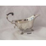 Sauce boat with flying scroll handle, heavy claw feet, 6” over handle B’ham 1939 by WN ltd. 120g.
