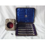 Boxed set of pistol handle tea knives, also a clock case