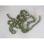 A string of old jade beads