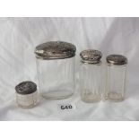 Four various dressing table jars