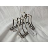 Art Deco four division shaped bar toast rack, 3” wide B’ham 1933 by D & F 68g.