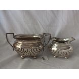 Cream jug and matching sugar basin with swirl reeded sides, 7.5” over handles Chester 1906 by