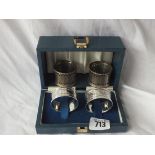 Two pairs of circular napkin rings, 65g. contained in a box