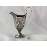 Georgian helmet shaped cream jug, sides embossed with fruit, raised on pedestal foot, 4” over handle