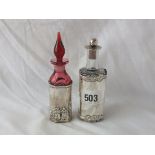 Scent sleeve embossed with figures, containing a red glass scent bottle, 5” over stopper Lon 1905 by