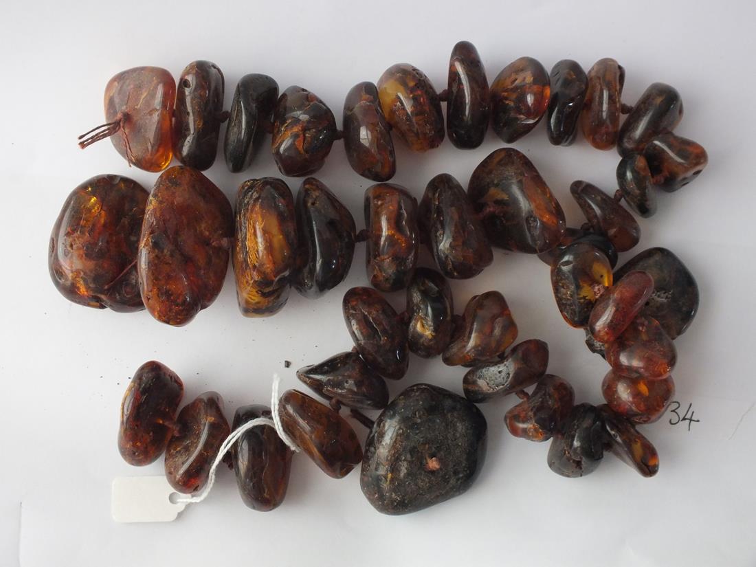 STRING OF HUGE AMBER BEADS 320g