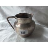Baluster shaped milk jug, 4.5” over handle Lon 1928 170g.