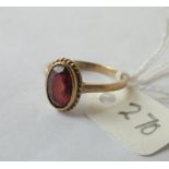 Oval garnet ring set in 9ct. size N 2.6g.