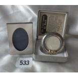 Small rectangular photo frame with oval aperture, 2.5” high .800 also another