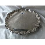 LARGE SALVER with moulded shell rim on three supports, 12” dia. 880g.
