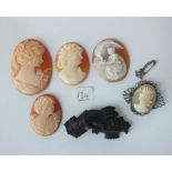 Carved jet coloured hand brooch and unmount cameo etc.