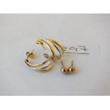 Pair of two coloured gold earrings plus a pair of gold studs