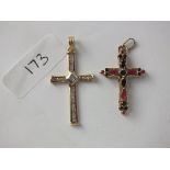 Diamond set cross in gold and an enamelled cross