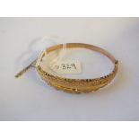 9ct. gold fancy bangle 7g.