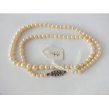 Vintage cultured pearls on silver clasp