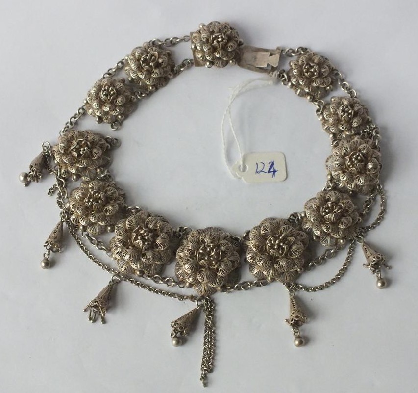 Ornate silver filigree collar