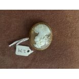 Oval cameo brooch of a lady with 9ct. mount
