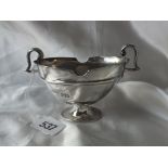 Boat shaped two handled Victorian trophy cup, 5” over handles Lon 1883 110g.