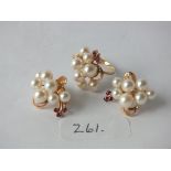 Large pair of pearl and ruby earrings set in 14ct. gold