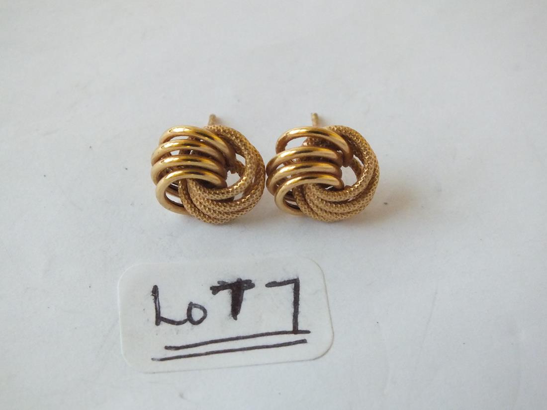 Pair of chased 9ct knot earrings