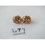 Pair of chased 9ct knot earrings