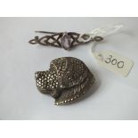Silver and marcasite dog brooch and another