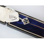 Art deco sapphire and diamond five stone stick pin set in gold with case