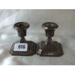 Pair of dwarf candlesticks with canted bases, 2.5” high B’ham 1929
