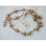 9ct. neck chain set with pearls at intervals, 15” long 10.5g.