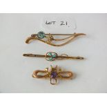 Three decorative bar brooches set with an amethyst, turquoise etc.