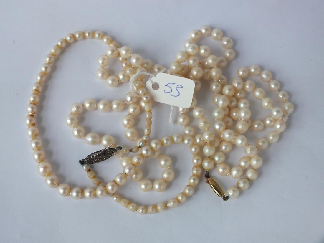 Two pearl necklaces; one with 9ct clasp