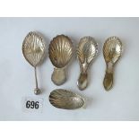 Group of five caddy spoons, one Shef 1791 by NS & Co, the others plate