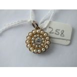 Circular diamond two row pearl pendant set in gold