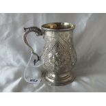 EXETER. VICTORIAN PEAR SHAPED PINT MUG embossed with panels of flowers and strap work on pedestal