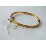 Rolled gold bangle crispy engraved with scolls