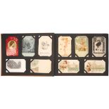 Postcards. Collections in 10 antique albums. (1300 approx.) All-world mixed ranges including