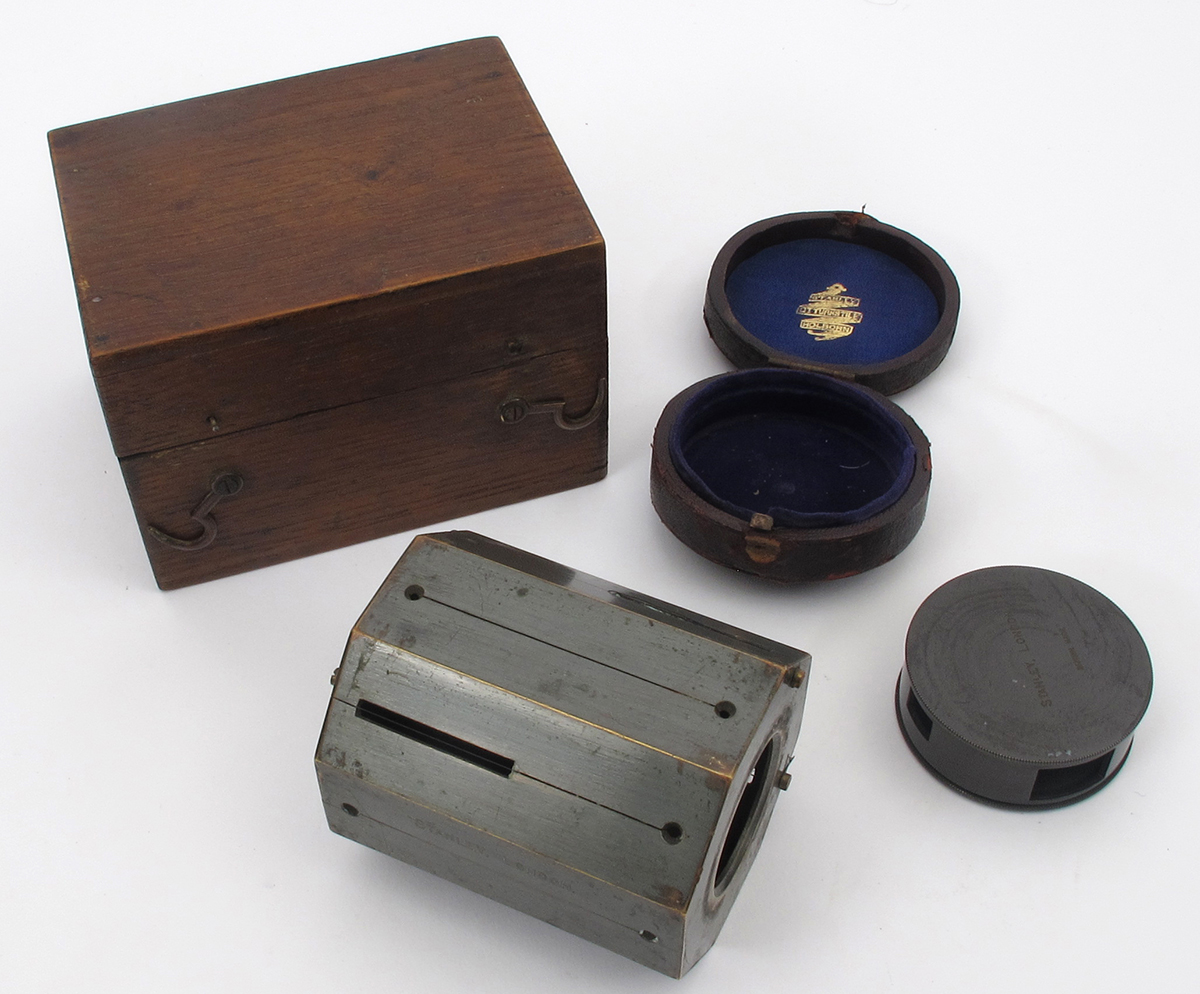 Early 20th century surveyor's instruments. An optical square in fitted leather case and a surveyor's